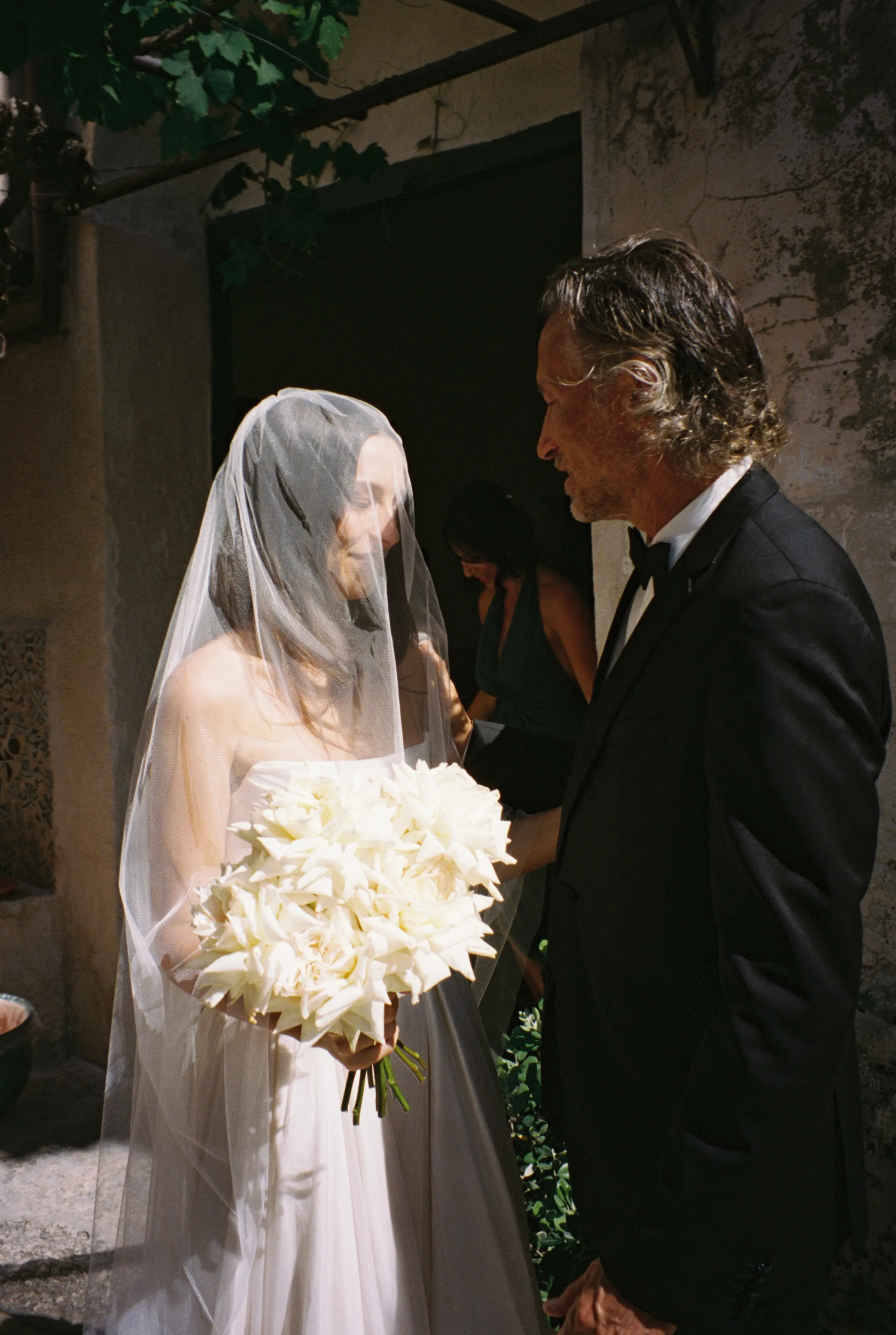 The veiled bride meeting the groom
